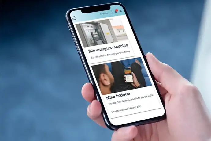 En telefonskärm i förgrunden som visar olika innehåll.